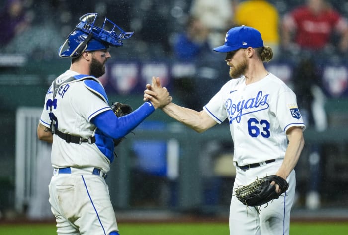 May 19, 2021; Kansas City, Missouri, USA; Kansas City Royals relief pitcher Josh Staumont (63) celebrates with catcher Cam Gallagher (36) after defeating the Milwaukee Brewers at Kauffman Stadium. Mandatory Credit: Jay Biggerstaff-USA TODAY Sports